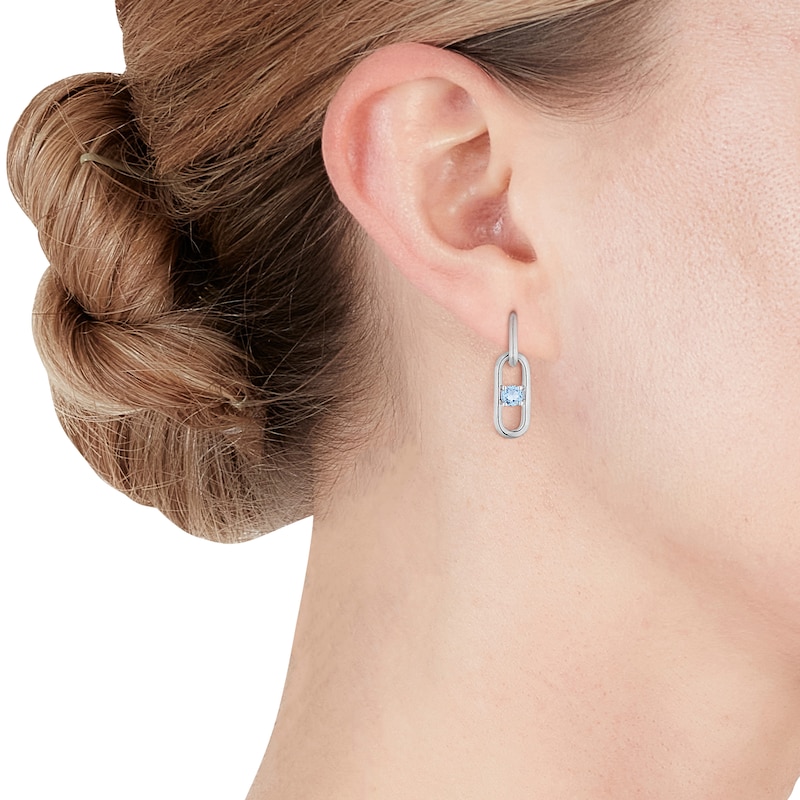 Silver Blue Topaz Oval Stud Earrings