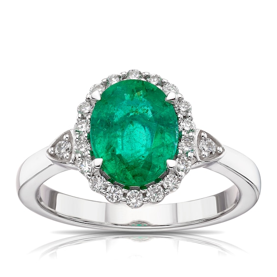 18ct White Gold Emerald and 0.25ct Diamond Halo Ring