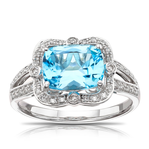 9ct White Gold Blue Topaz 0.15ct Diamond Halo Ring