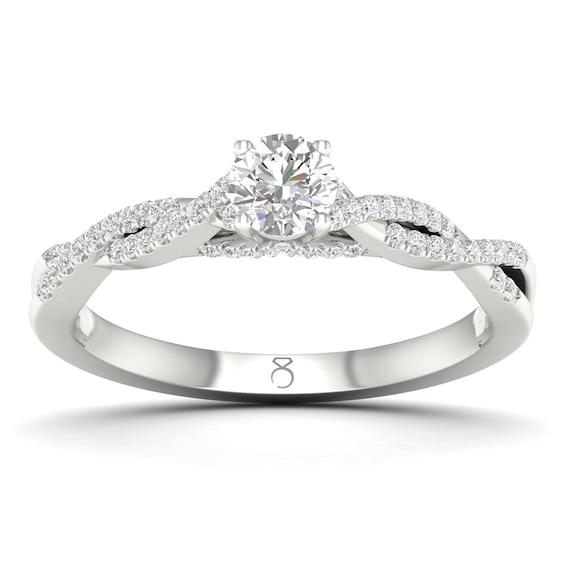 The Diamond Story Platinum 0.40ct Total Diamond Twist Ring