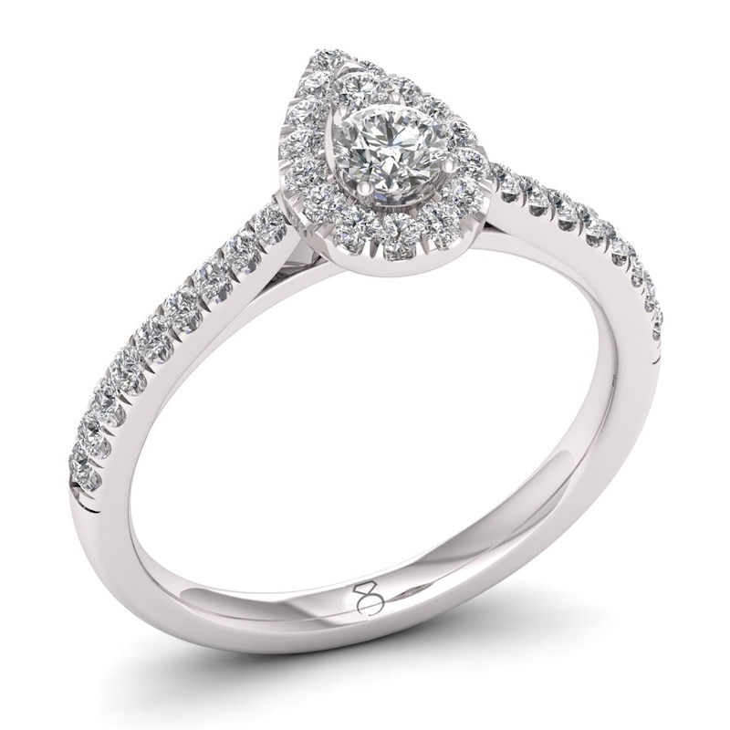 The Diamond Story Platinum 0.50ct Diamond Pear Halo Ring