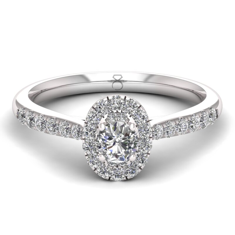 The Diamond Story Platinum 0.50ct Oval Halo Ring