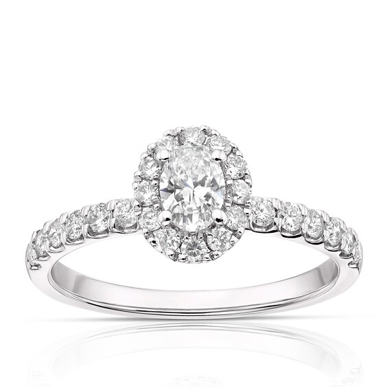 18ct White Gold 0.75ct Total Diamond Oval Halo Ring Ernest Jones