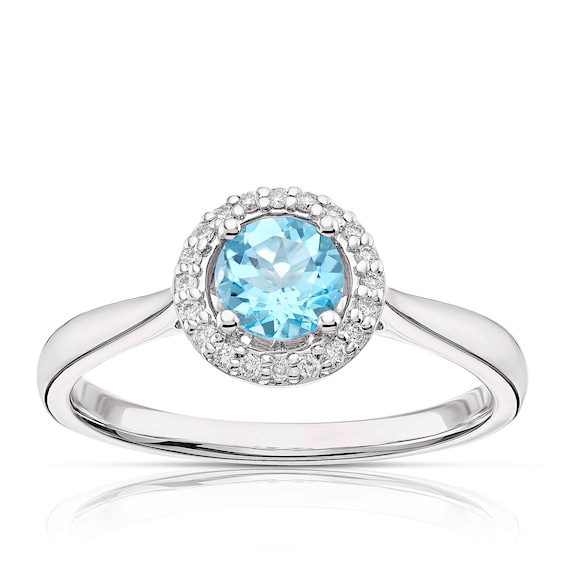 9ct White Gold Blue Topaz 0.07ct Diamond Halo Ring