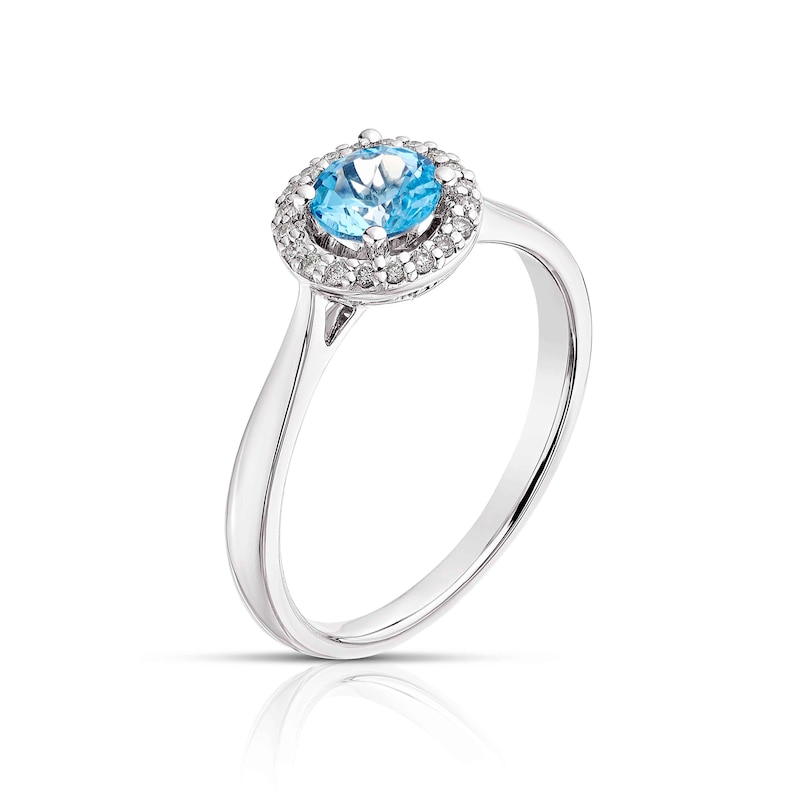 9ct White Gold Blue Topaz 0.07ct Diamond Halo Ring